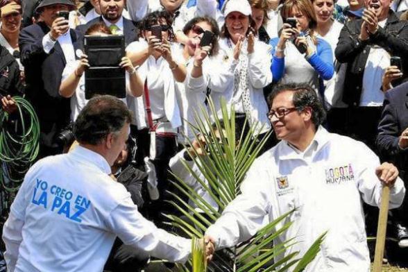 Juan Manuel Santos y Gustavo Petro, en la marcha del 9 de abril