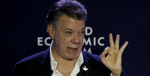 Santos amenaza a los colombianos